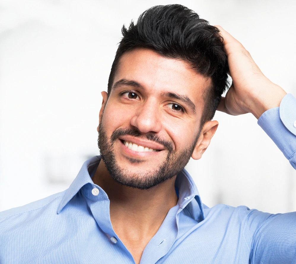 Male With Full Head of Hair Smiling