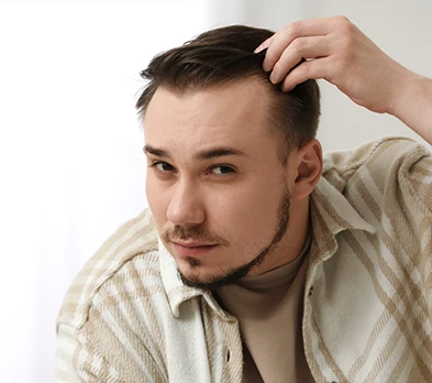 Benefits  Photo Man Looking Concerned About His Receding Hairline
