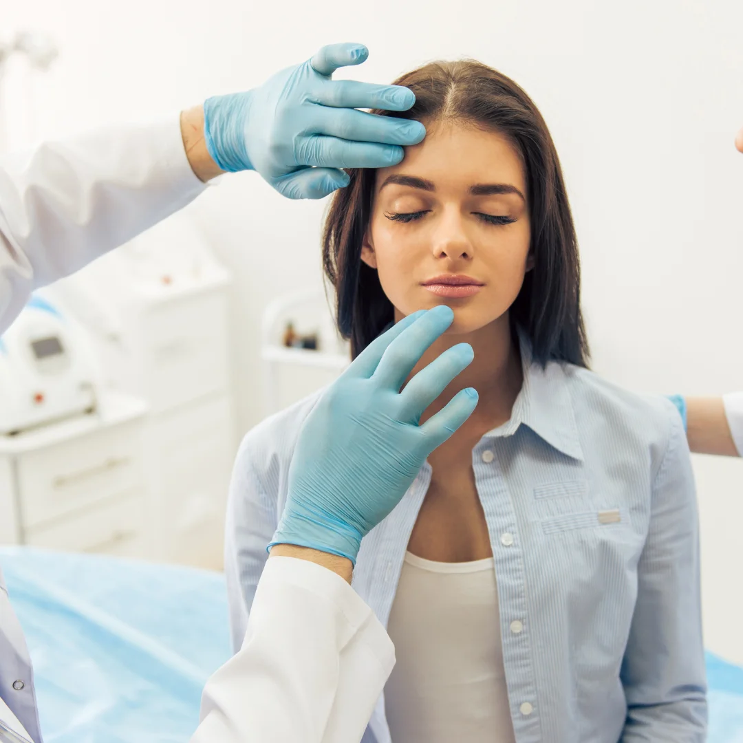 Female patient receiving professional evaluation for lip lift surgery