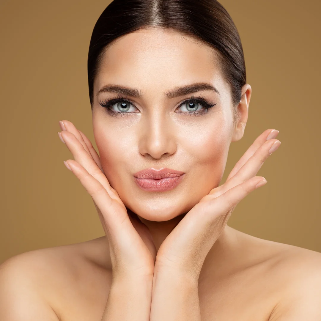 Woman with full, well-defined lips after a lip lift procedure