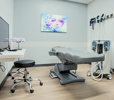 Why Columbus  Photo Modern aesthetic treatment room equipped with advanced technology and comfortable furniture,