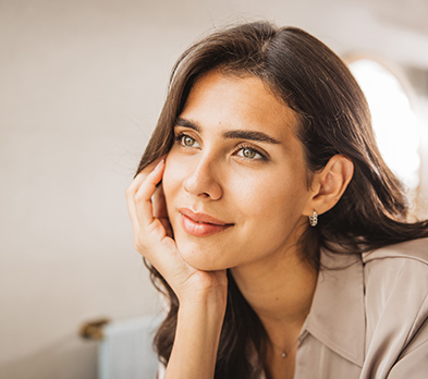 Key Benefits of Facial Liposuction Photo Woman with refined jawline appearance after facial liposuction procedure