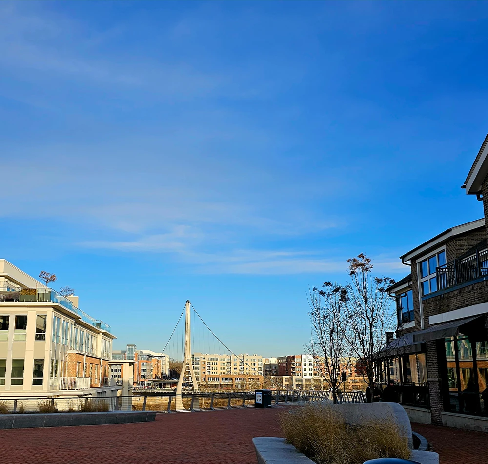 Serving Patients Across Ohio: Modern city plaza and bridge under blue sky